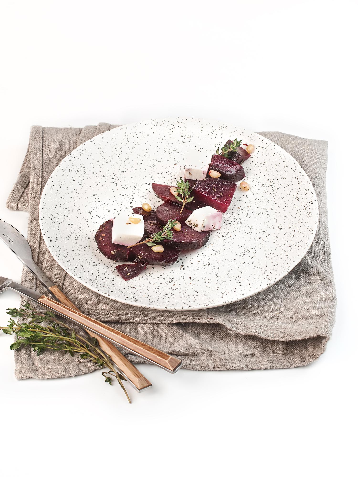Set of plated appetizers on wooden table